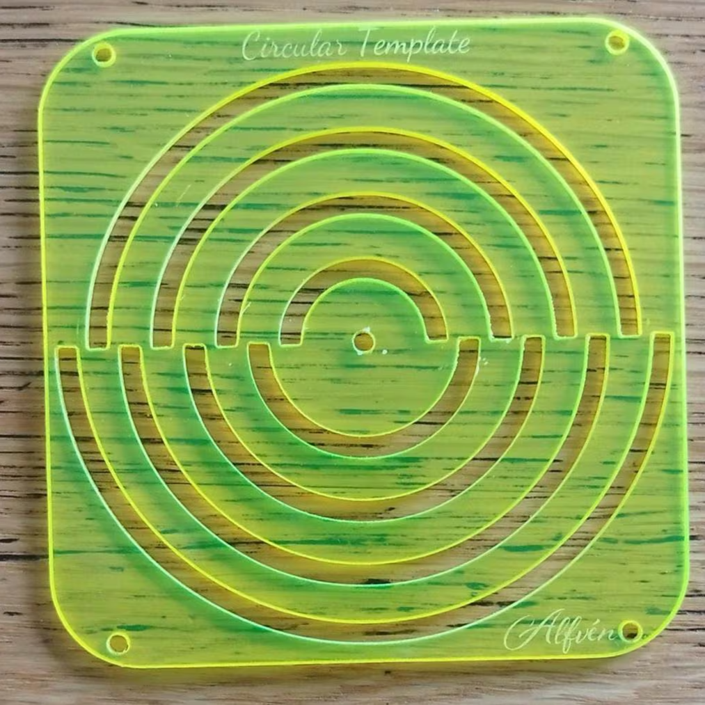Circular template with concentric semi circles on a wooden surface