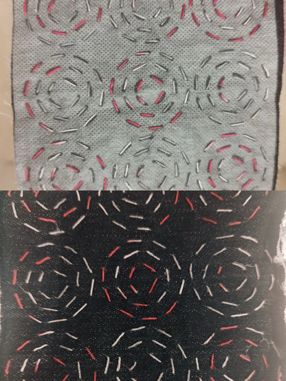 Top image shows pink and white stitching of concentric circles design through the transfer. Bottom image shows concentric circle design result after transfer is washed away.